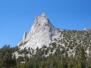 Landscape of grey mountain with sharp peak