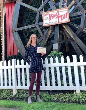 Julia Person stands in front of Bob's Red Mill