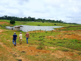 Farmers walking in field